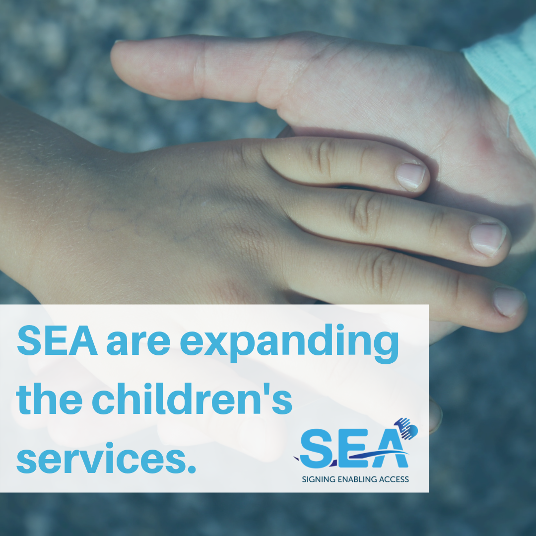 Two children's hands with expansion of services